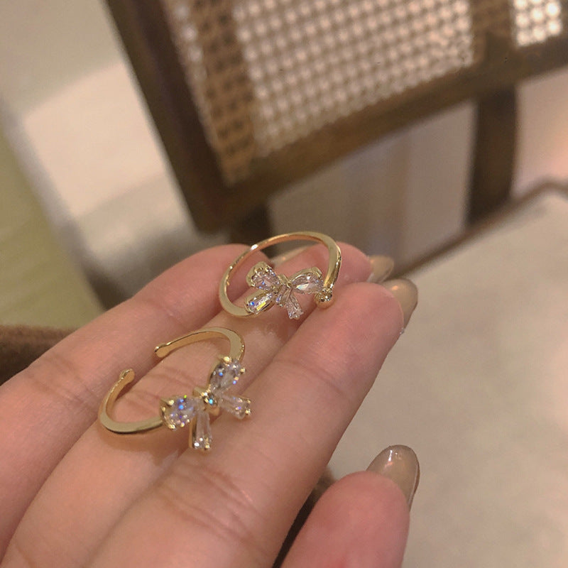 Zircon Bow Rings