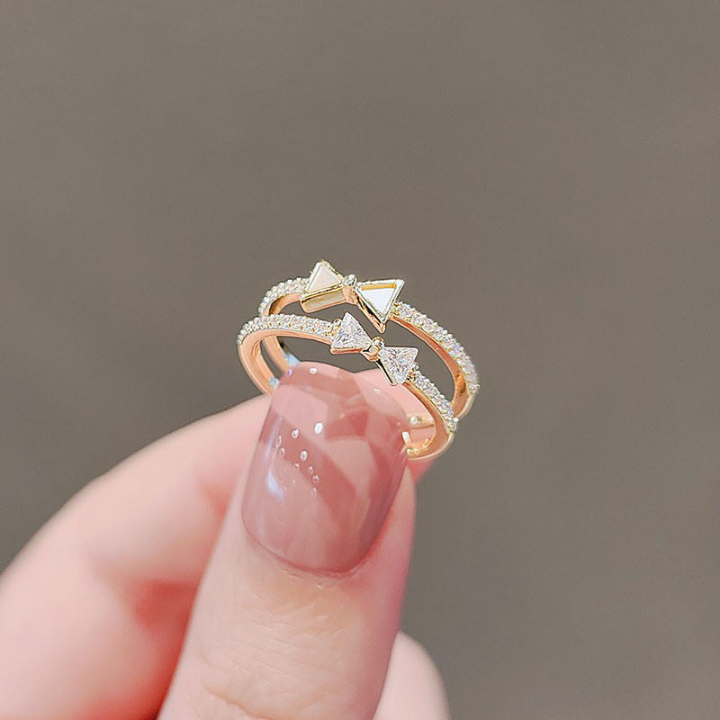 Zircon Bow Rings