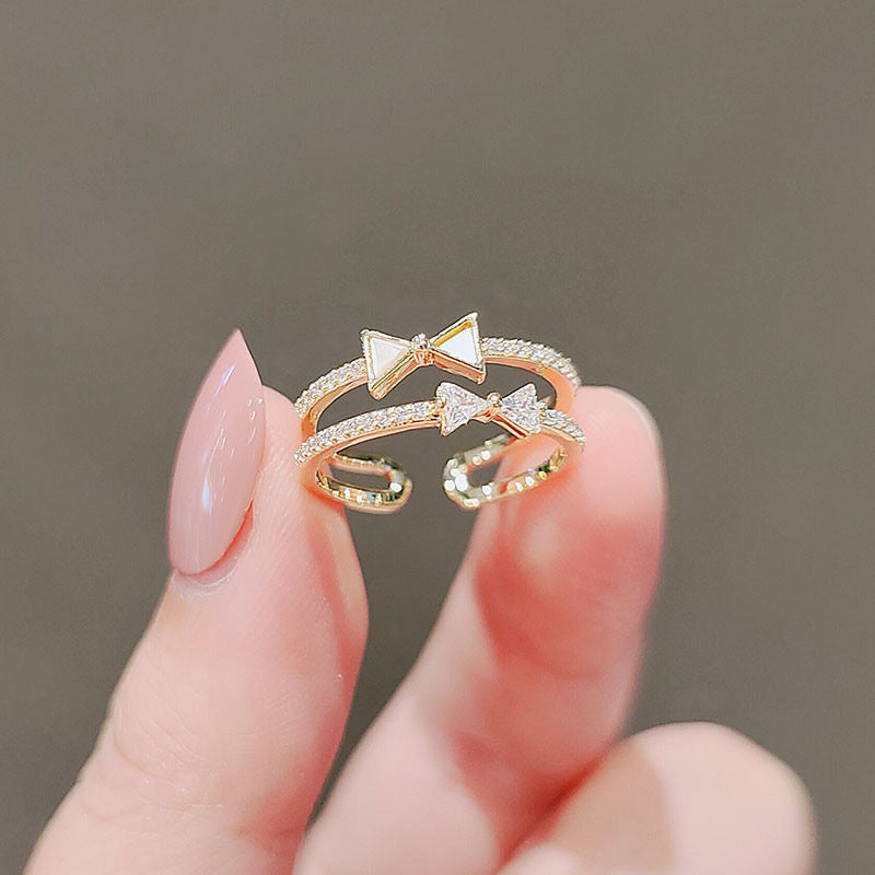 Zircon Bow Rings