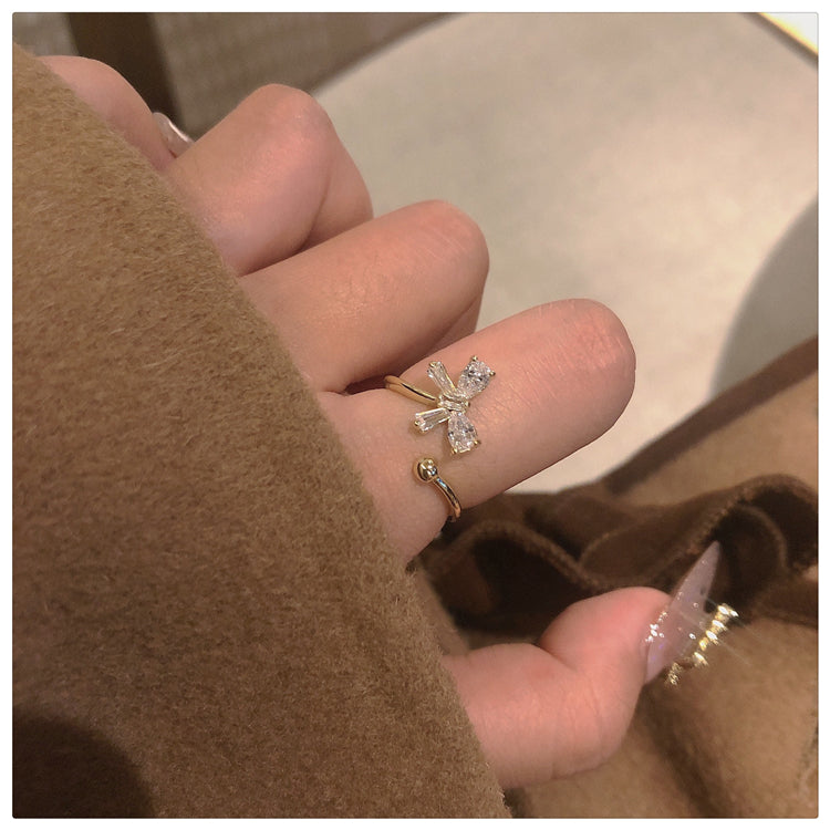 Zircon Bow Rings