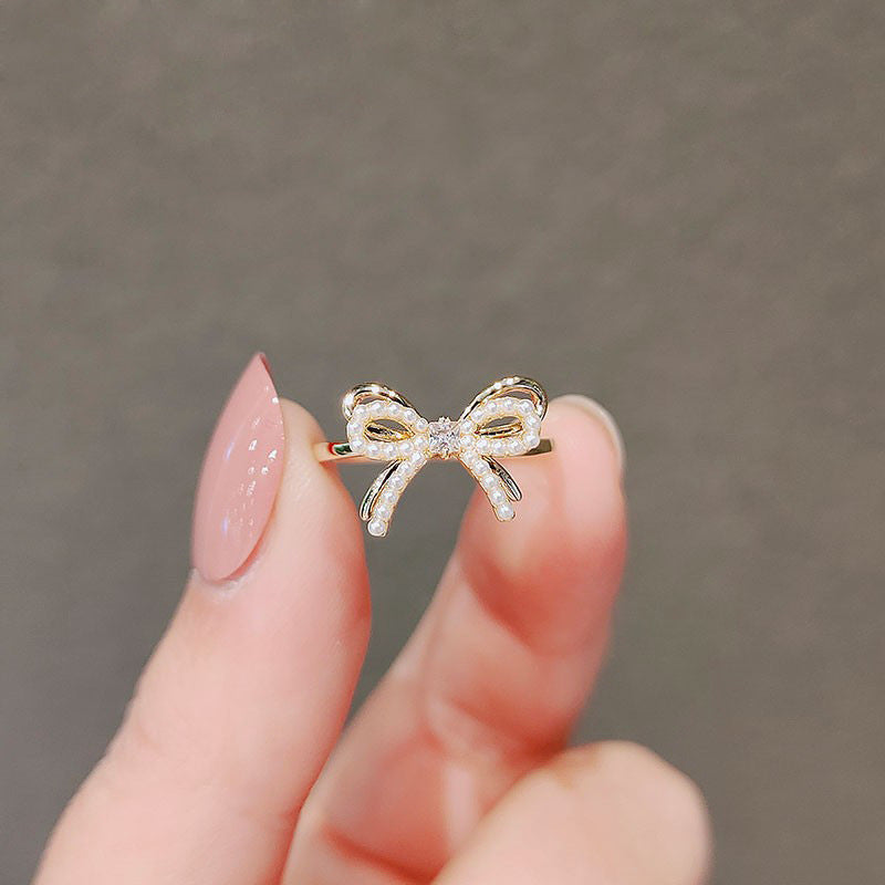 Zircon Bow Rings